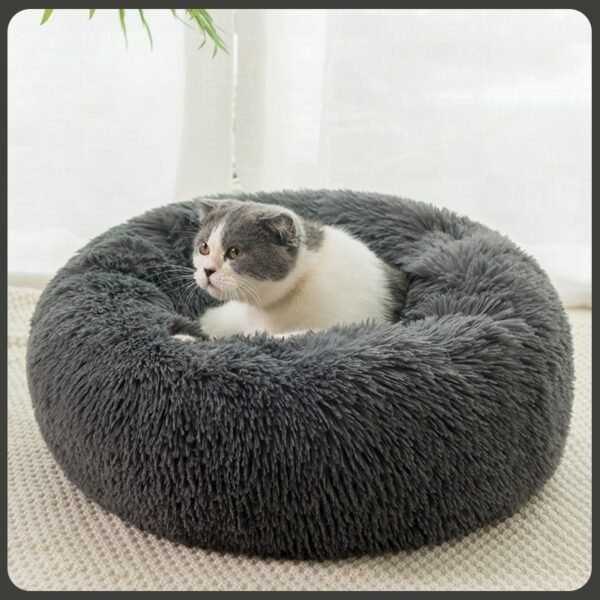 26c731ca-11f5-4f50-9162-3f36975c3449.jpg Plush Donut Dog Bed – Ultimate 9-Size Comfort Dogs Love